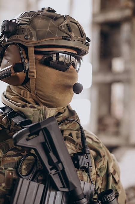 Soldier in helmet and protective equipment